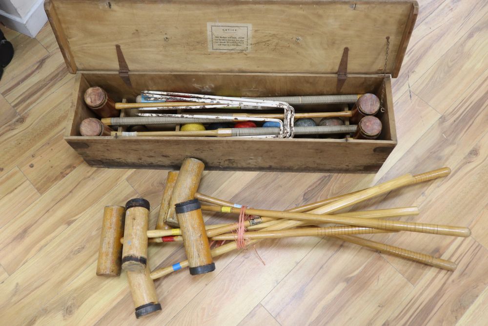 A Gamages croquet set, boxed and a half croquet set